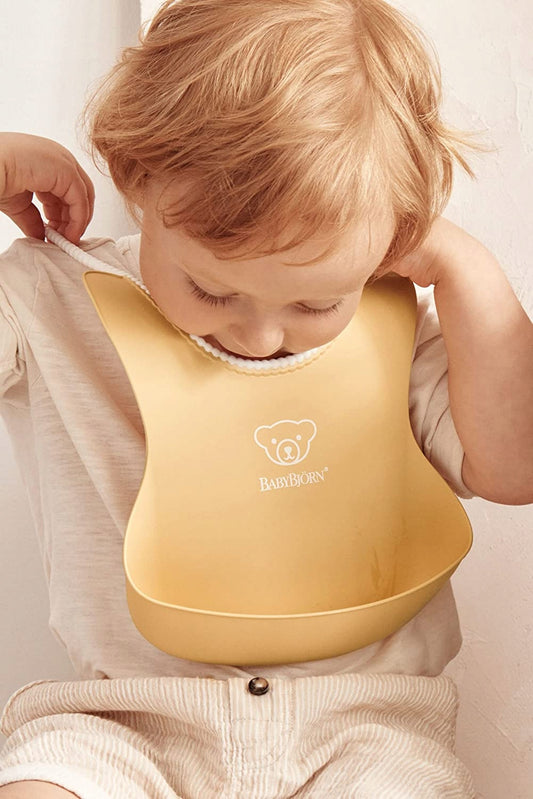 BABYBJORN babero de silicona con bolsillo x2