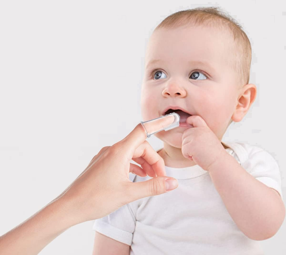 LOLA KIDS cepillo de dientes de silicona para dedo con funda