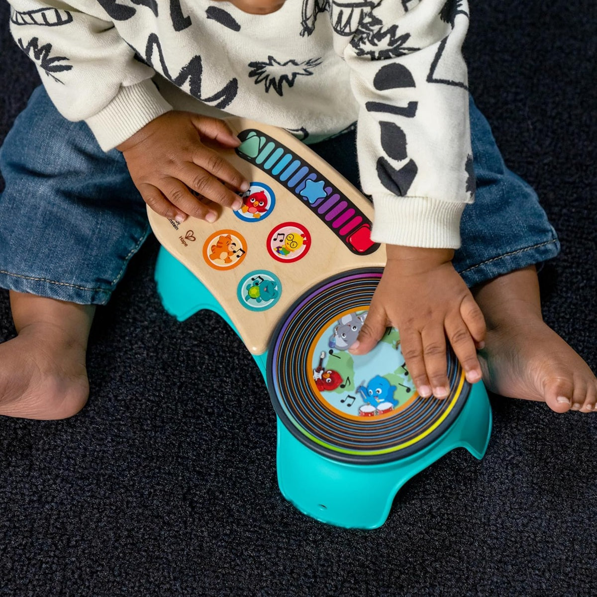 Baby Einstein DJ Discovery consola táctil de madera con 50 melodías y sonidos