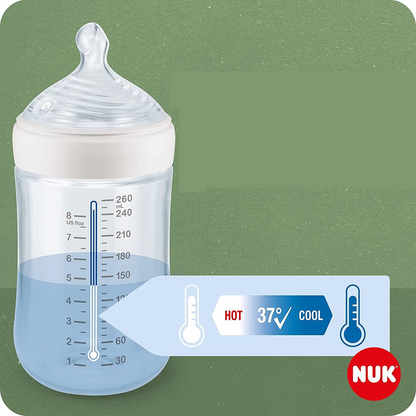 NUK For Nature biberón 150 ml 1 m+ chupete S flujo lento control de temperatura