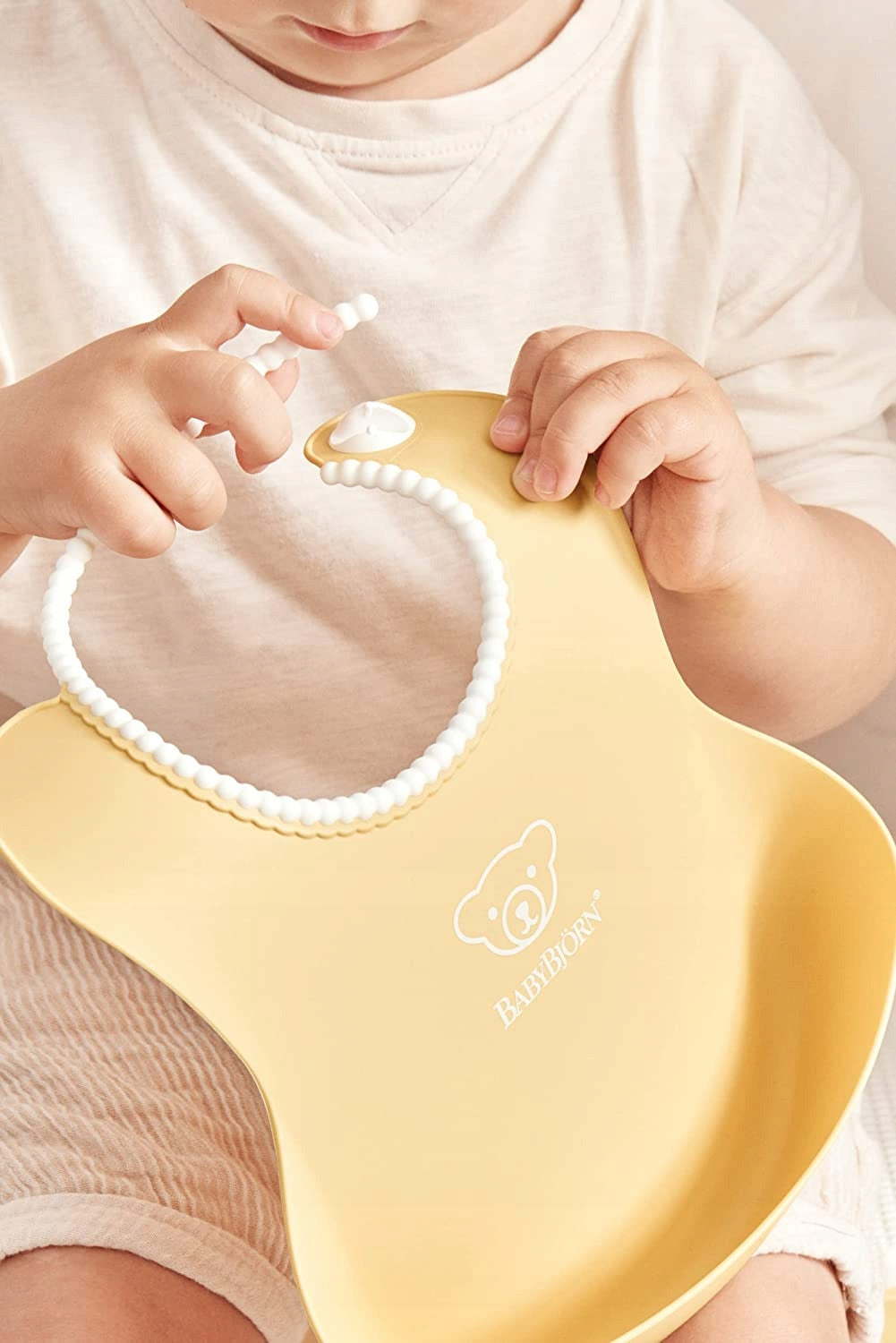 BABYBJORN babero de silicona con bolsillo x2