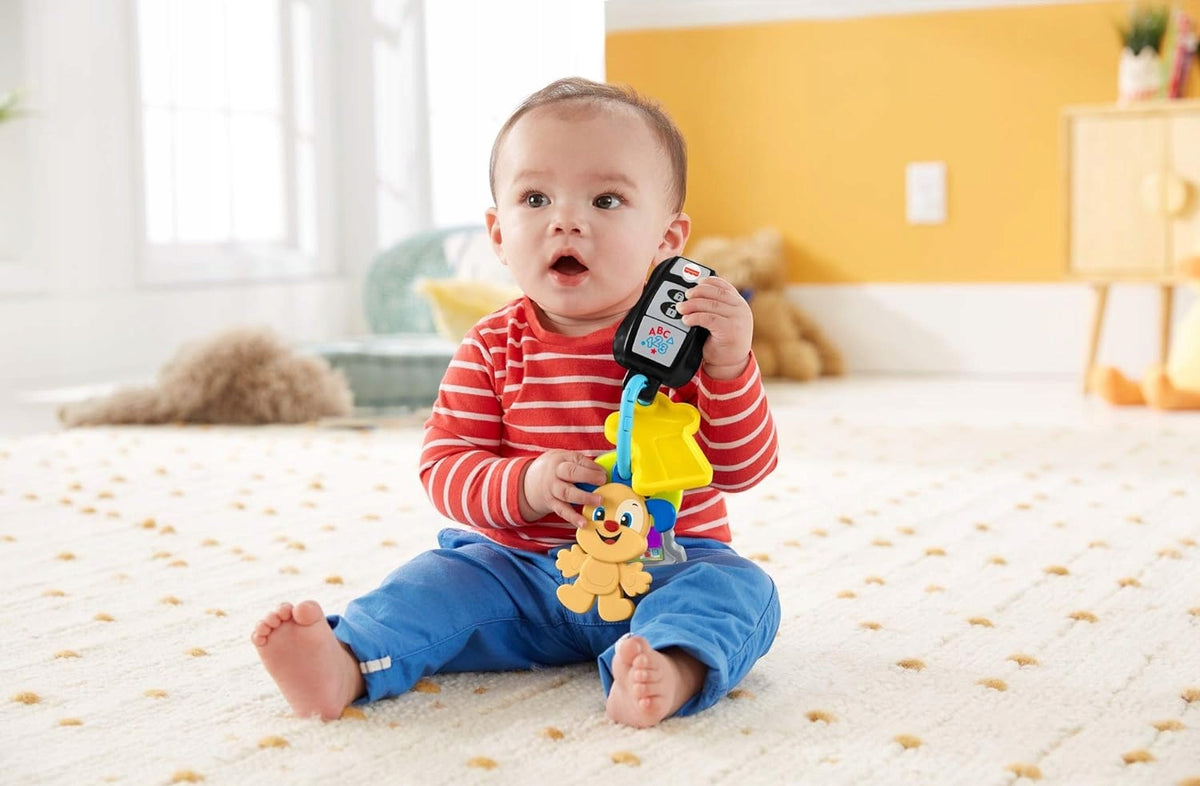 FISHER-PRICE interaktywne kluczyki samochodowe z brelokiem J. NIEMIECKI, zabawka dla niemowląt 6 m+