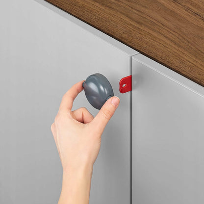 REER dispositivo de seguridad para armarios con puertas dobles 1 unidad