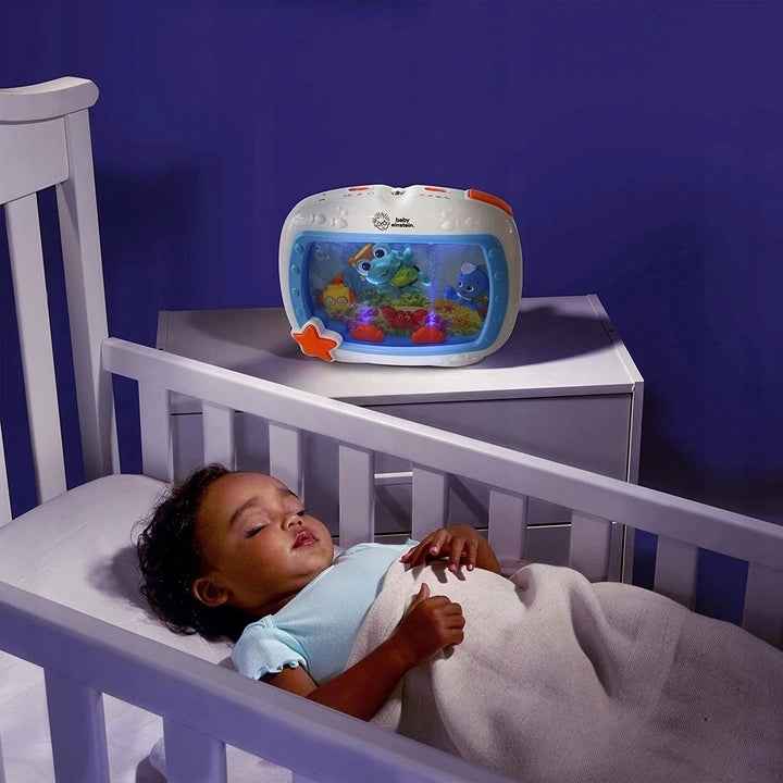 BABY EINSTEIN Sueños Marinos caja de música con mando a distancia