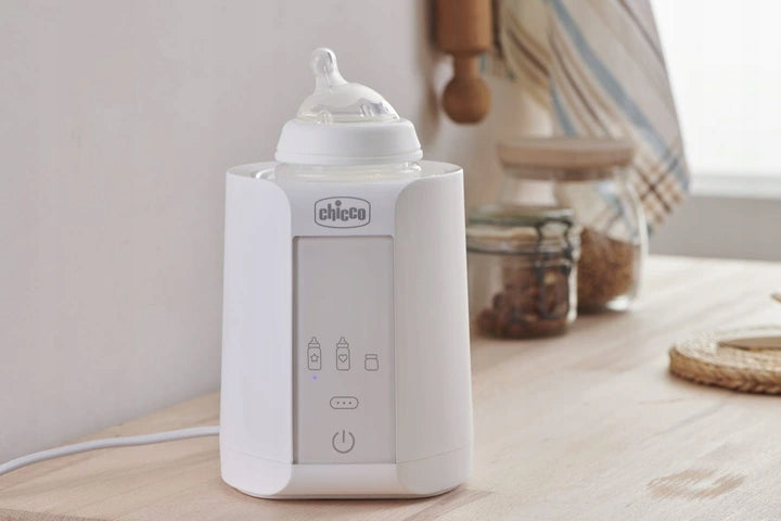 CHICCO Home Travel PODGRZEWACZ DO BUTELEK auto dom. Biały cyfrowy podgrzewacz butelek Chicco do domu i samochodu.