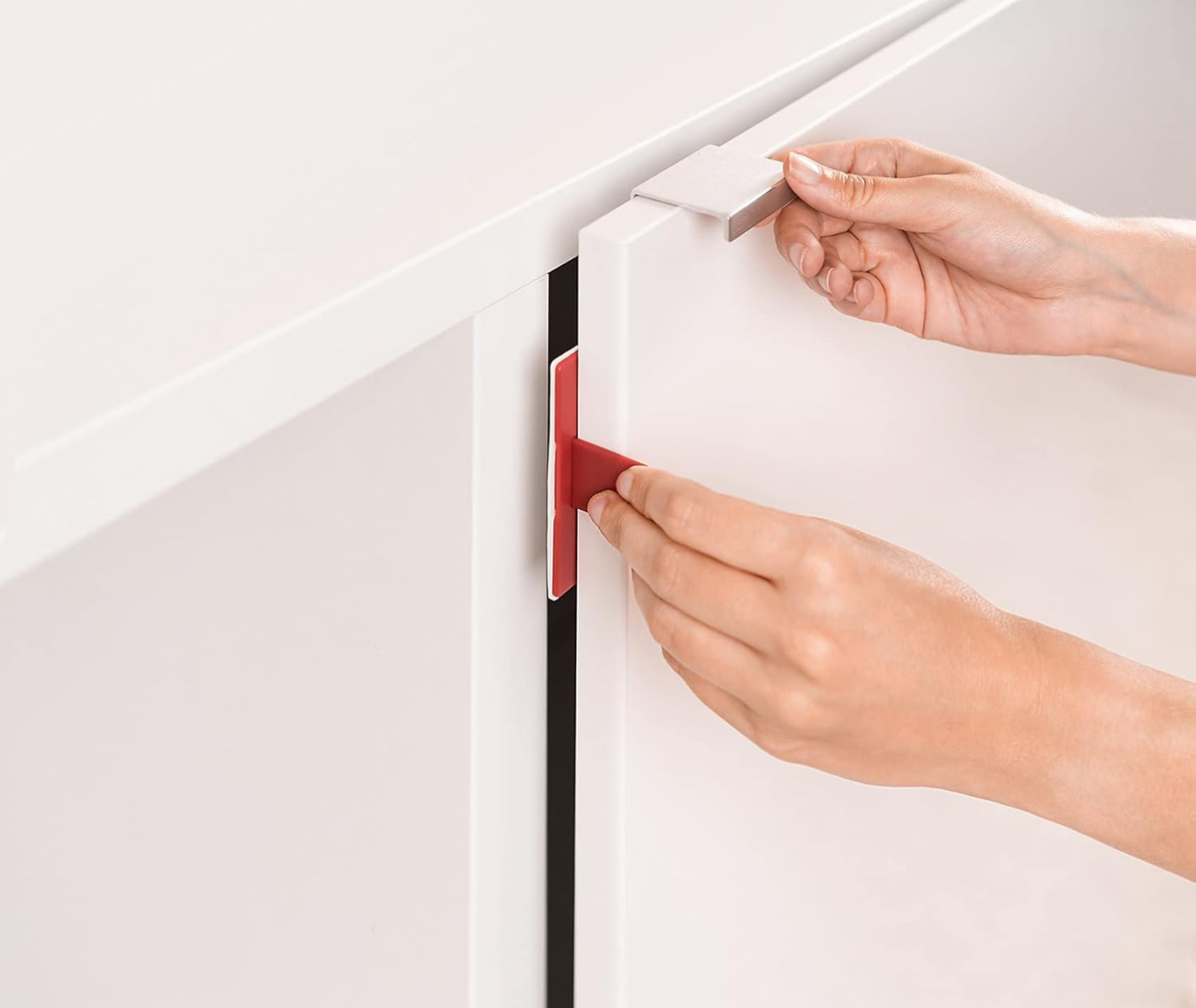 REER dispositivo de seguridad para armarios con puertas dobles 1 unidad