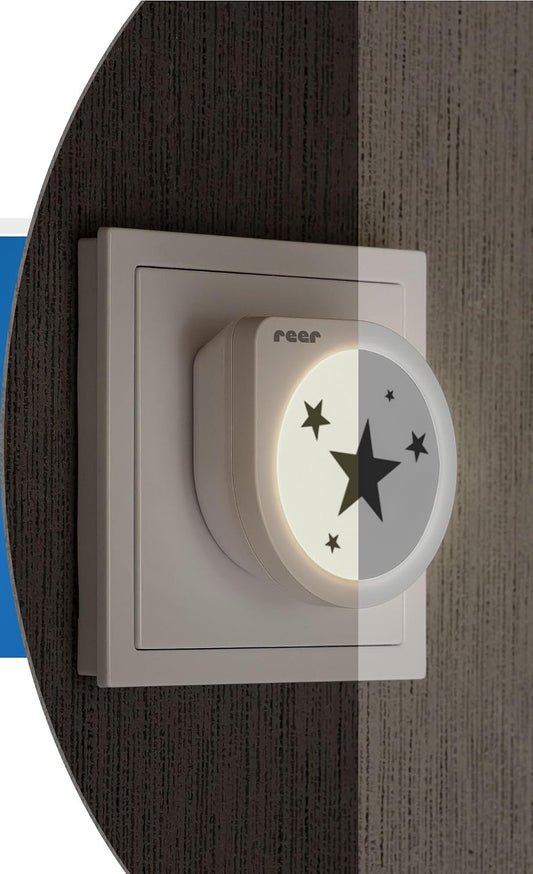 Lámpara nocturna LED REER NightGuide Star para enchufe, sensor de oscuridad
