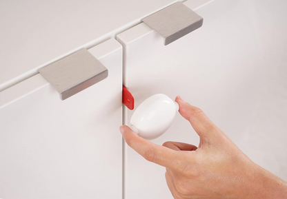 REER dispositivo de seguridad para armarios con puertas dobles 1 unidad
