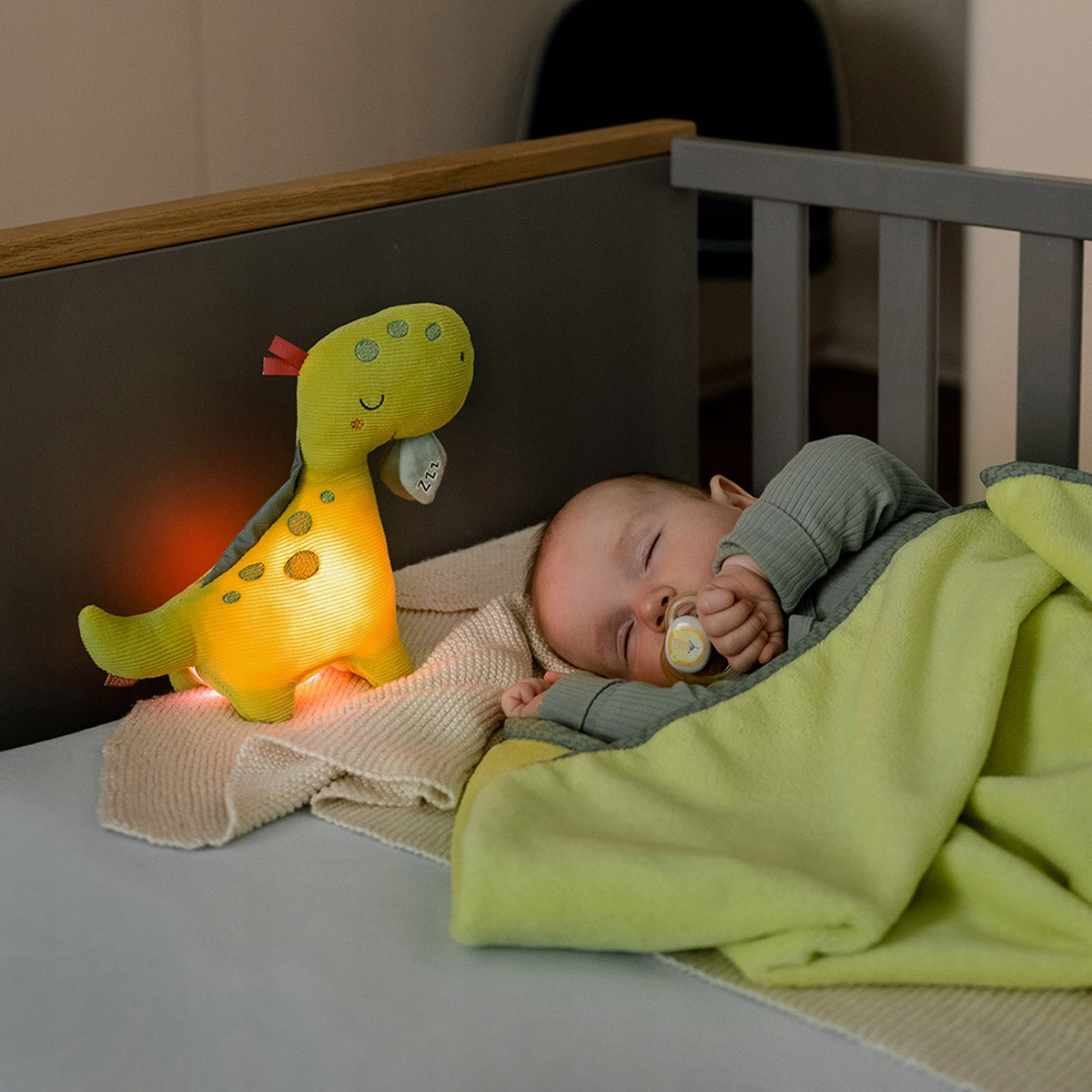 FEHN peluche de pana con luz nocturna DINO 20 x 23 cm