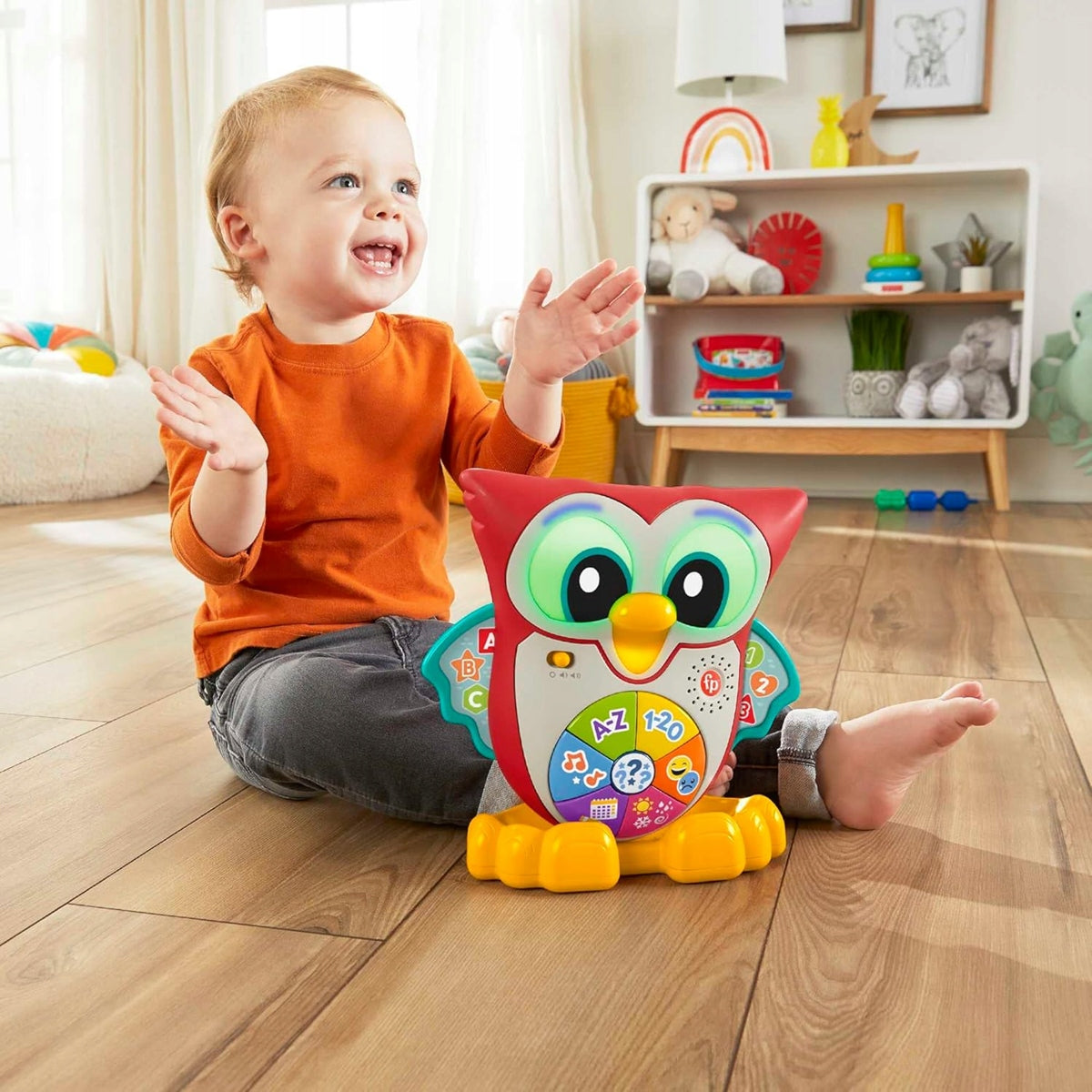 FISHER-PRICE búho interactivo con luces, 90 melodías y frases en alemán, 18 m+