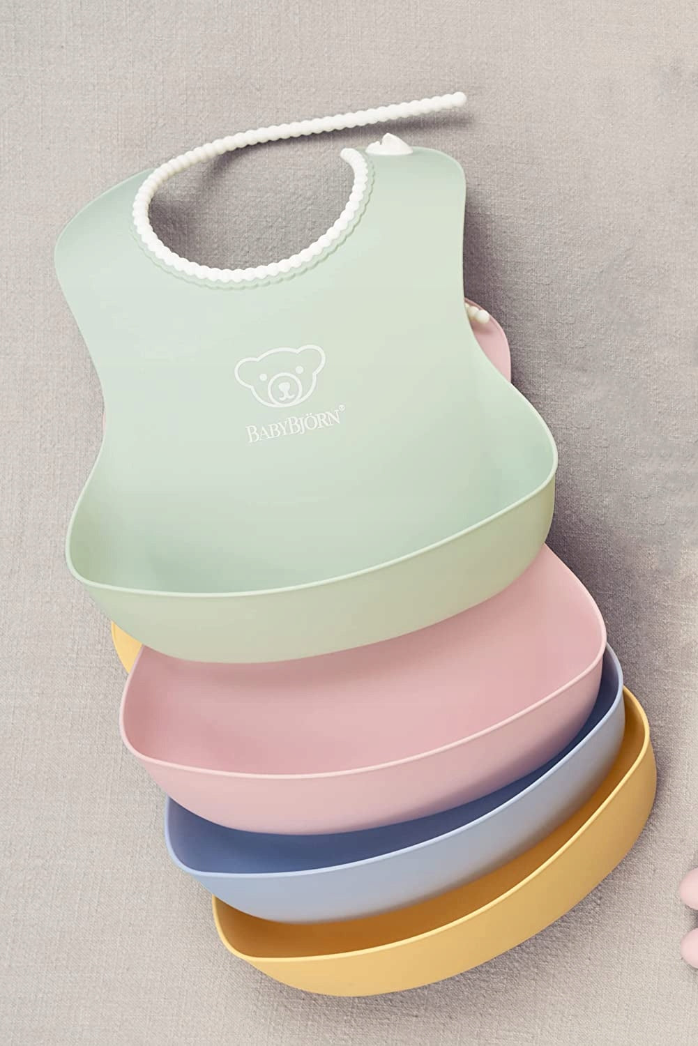 BABYBJORN babero de silicona con bolsillo x2