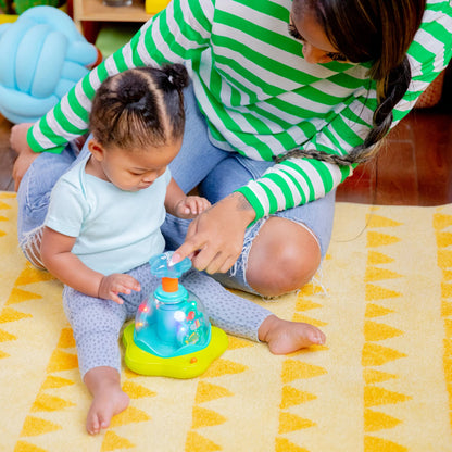 Bright Starts Press Glow Spinner juguete musical 6m+