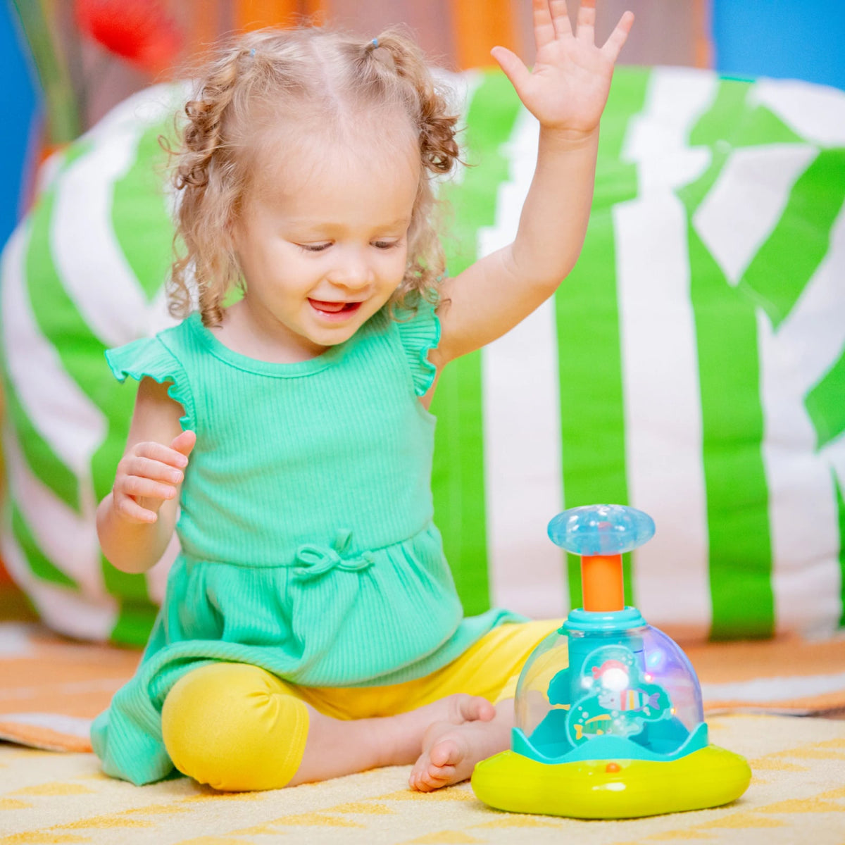 Bright Starts Press Glow Spinner juguete musical 6m+