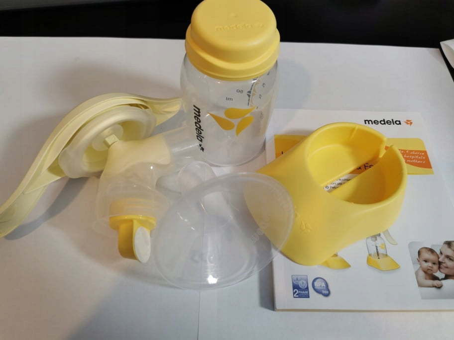 MEDELA Harmony 005.2052 laktator ręczny 2-fazowy U, żółty, używany, z akcesoriami