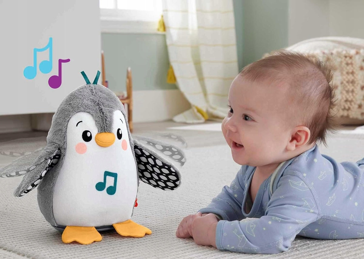 FISHER-PRICE HNC10 kiwający się pingwin z melodiami 21 cm, interaktywna zabawka dla niemowląt